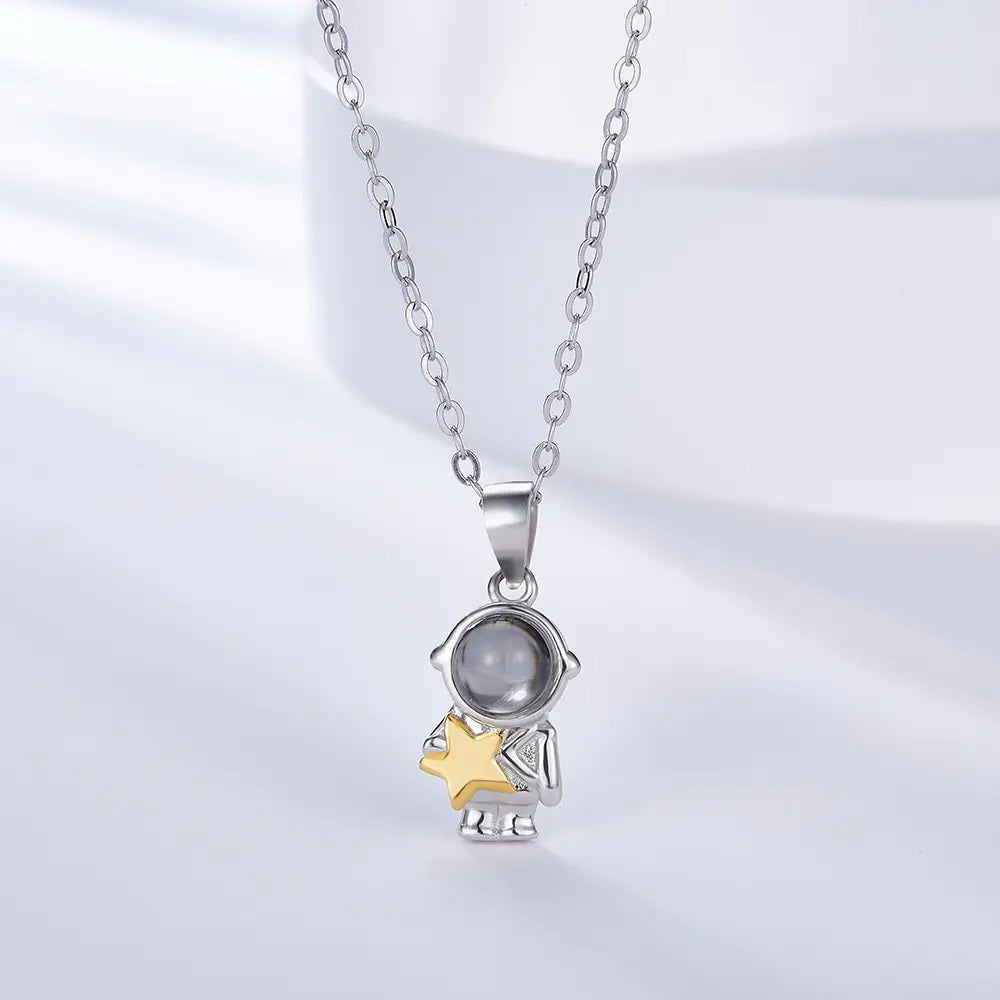 Astronaut Projection Necklace with Gold Star